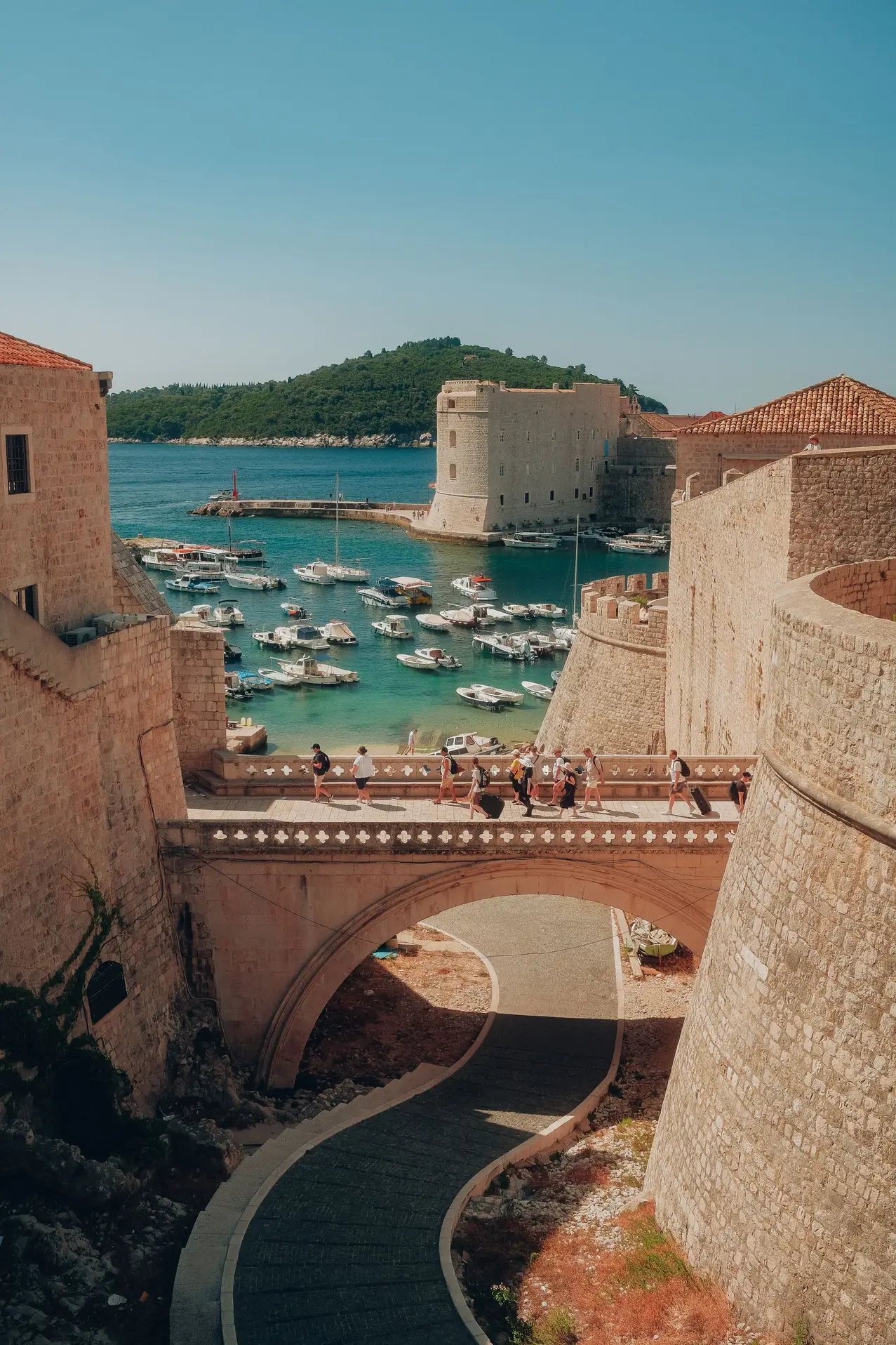 stone city walls with sea background