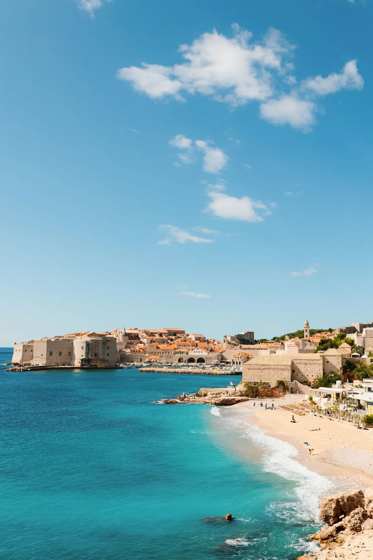 city beach with panoramic view of city walls